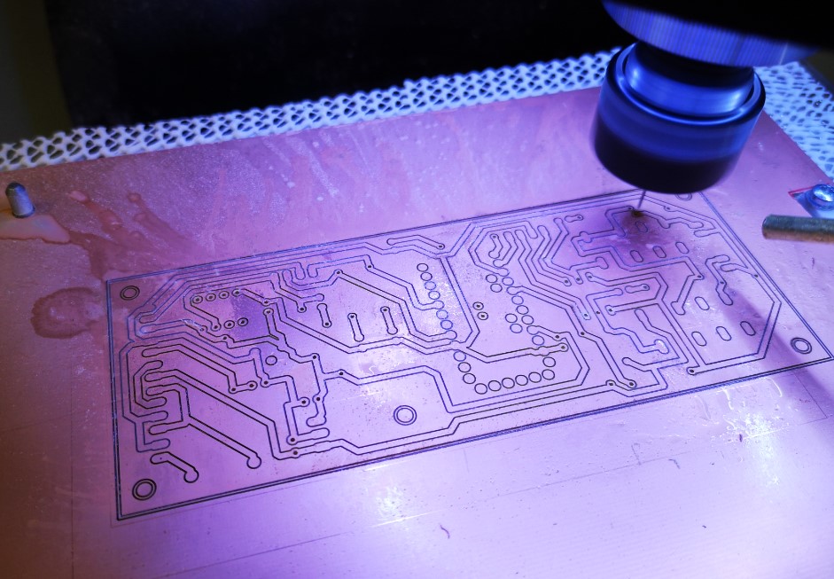 Test PCB being milled using the rubber sacrificial mat